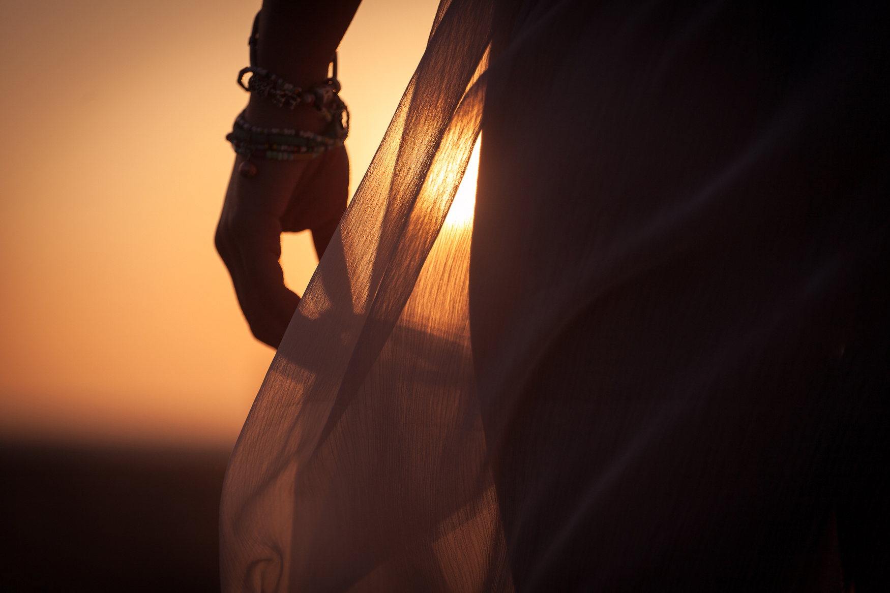 Woman on Beach at Sunset